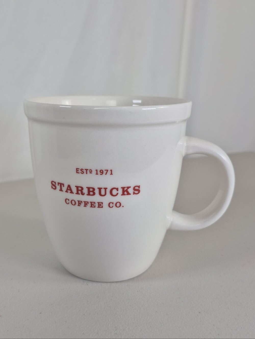Starbucks 2007 Holiday Abbey White Ceramic Coffee Mug with Red Logo